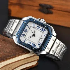 Luxury watch with blue and silver design on a wooden surface