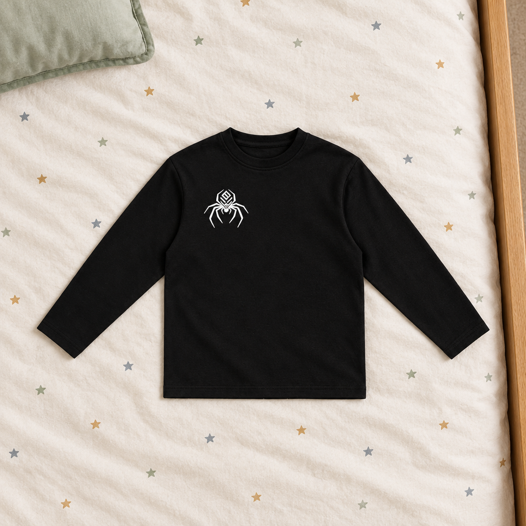 Black long-sleeve T-shirt front on star bedding