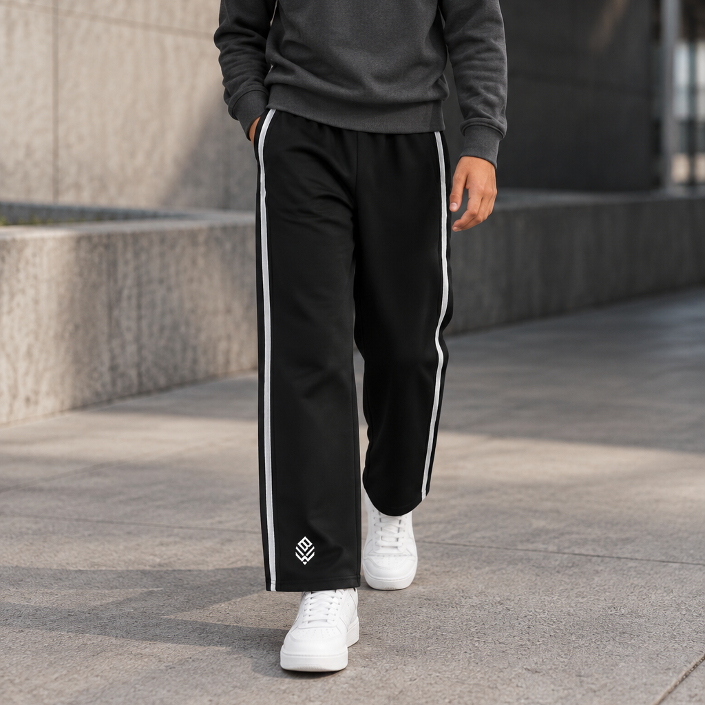Child model wearing Black contrast-tape sweatpants