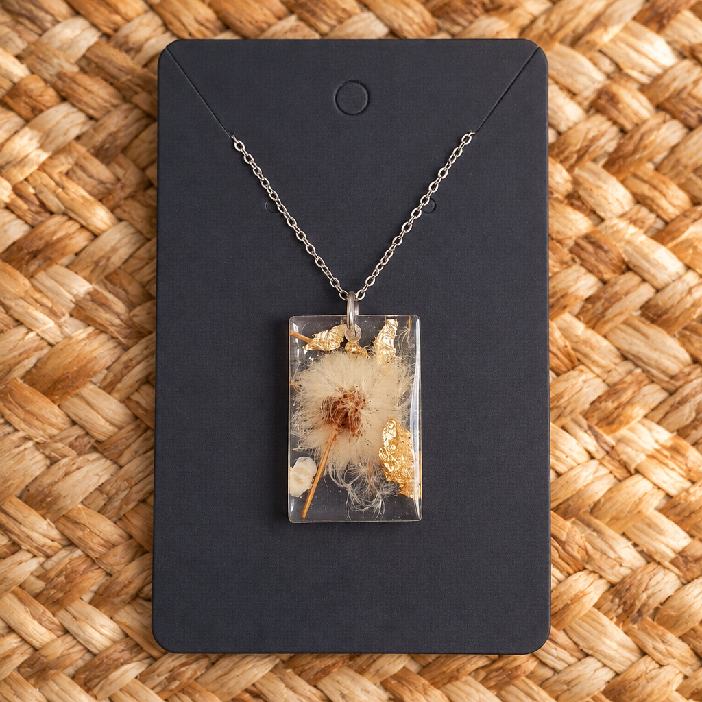 Dandelion necklace on warm basket weave
