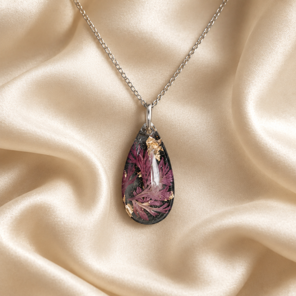 Enchanting Teardrop necklace on cream silk