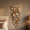 Floral wall hanging in a cosy luxury bedroom
