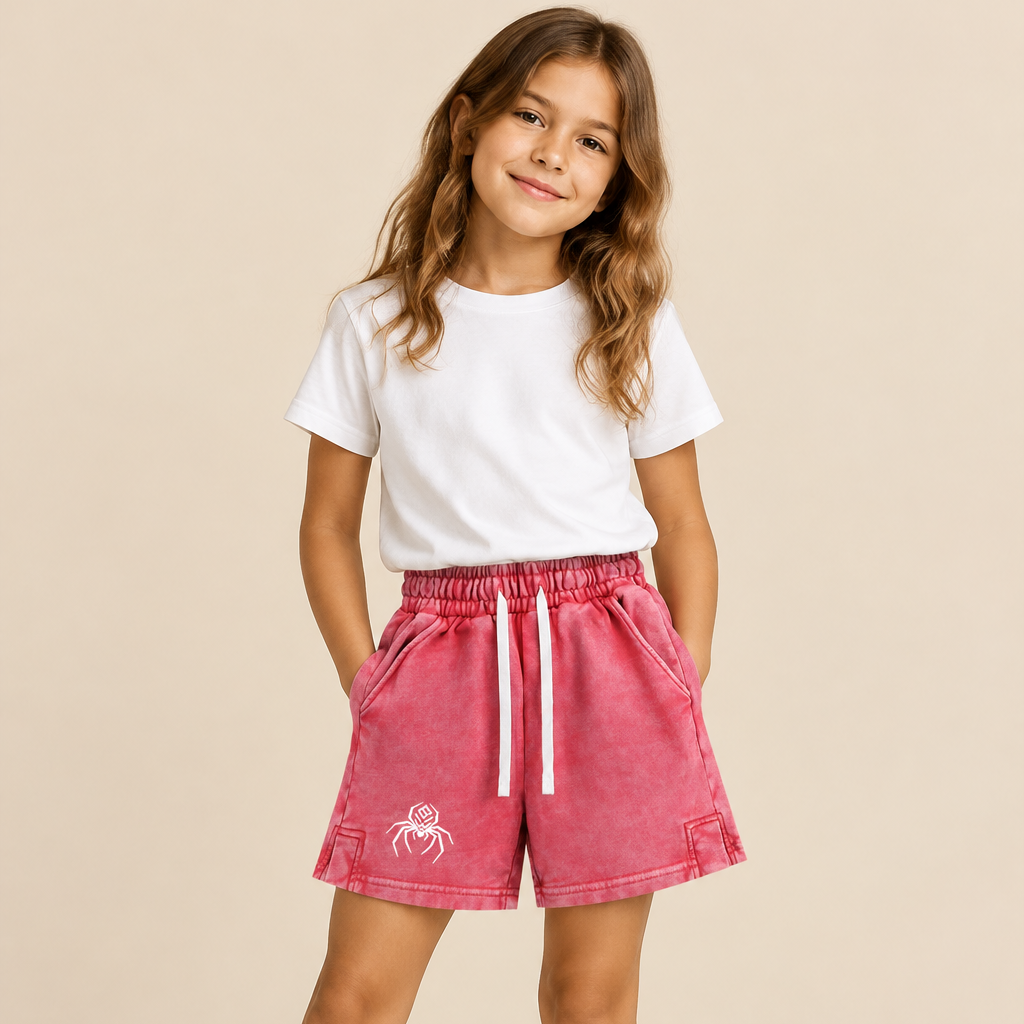 Girl wearing pink snow-washed BlkWidow shorts