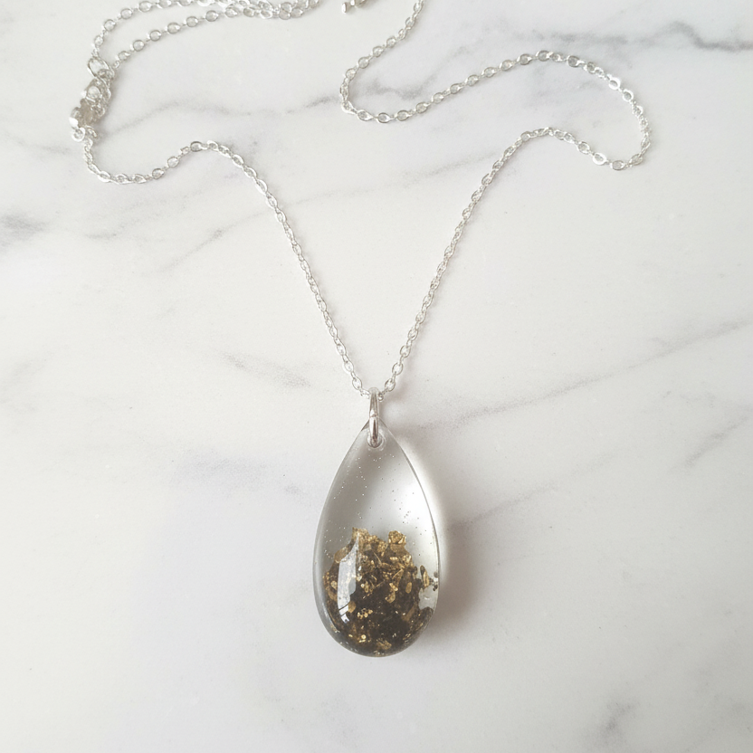 Gold Leaf Resin Teardrop Necklace on White Marble
