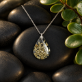 Green Crystal pendant with jade plant and black stones