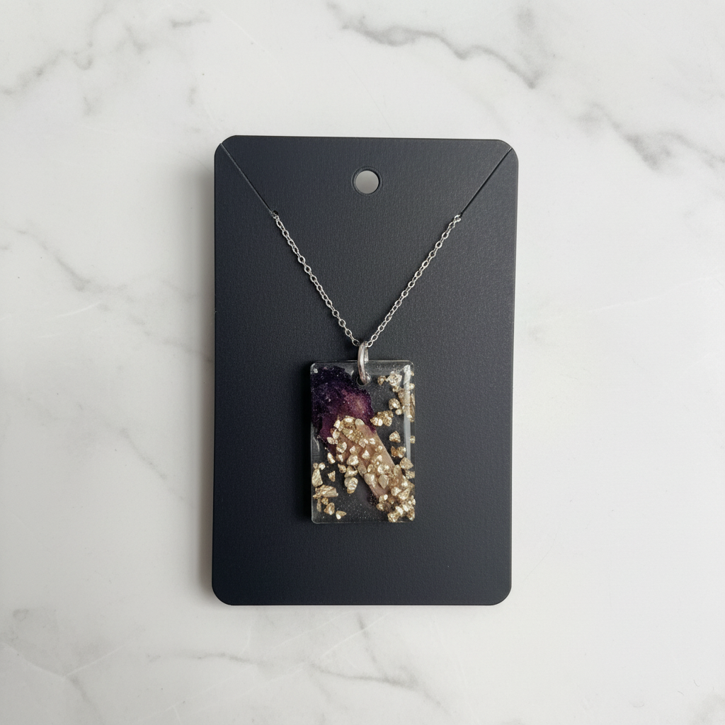 Snapdragon Green Crystal Pendant on white marble background