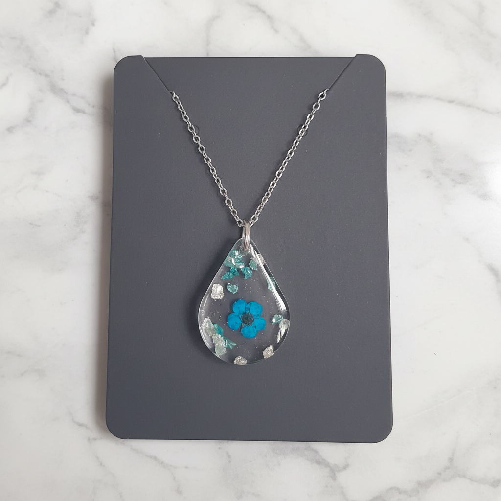 Rare Blue Flower Teardrop on marble background