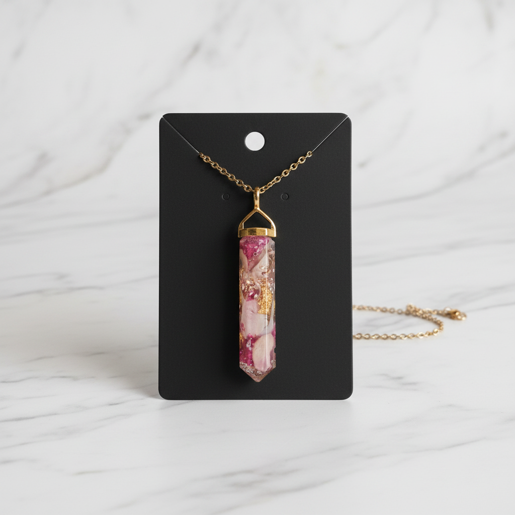 Pink white resin pendant on white marble