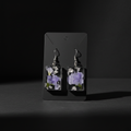 Rectangular resin earrings dark background