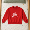 Red sweatshirt front on children’s star bedding