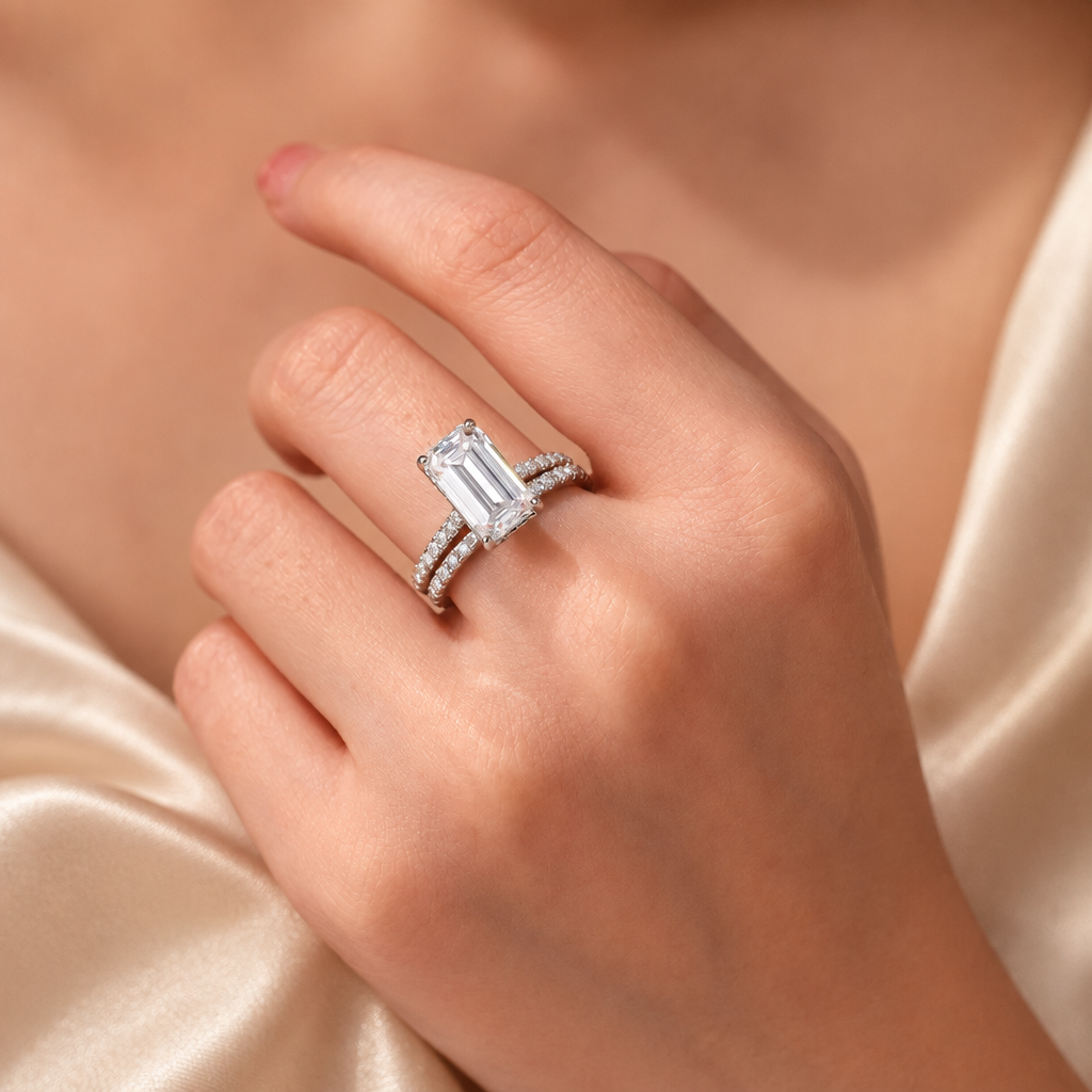 Ring set worn on hand with cream silk styling