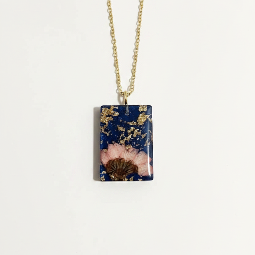 Square navy pendant on white background