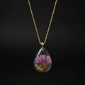 Teardrop clear resin with purple thistle