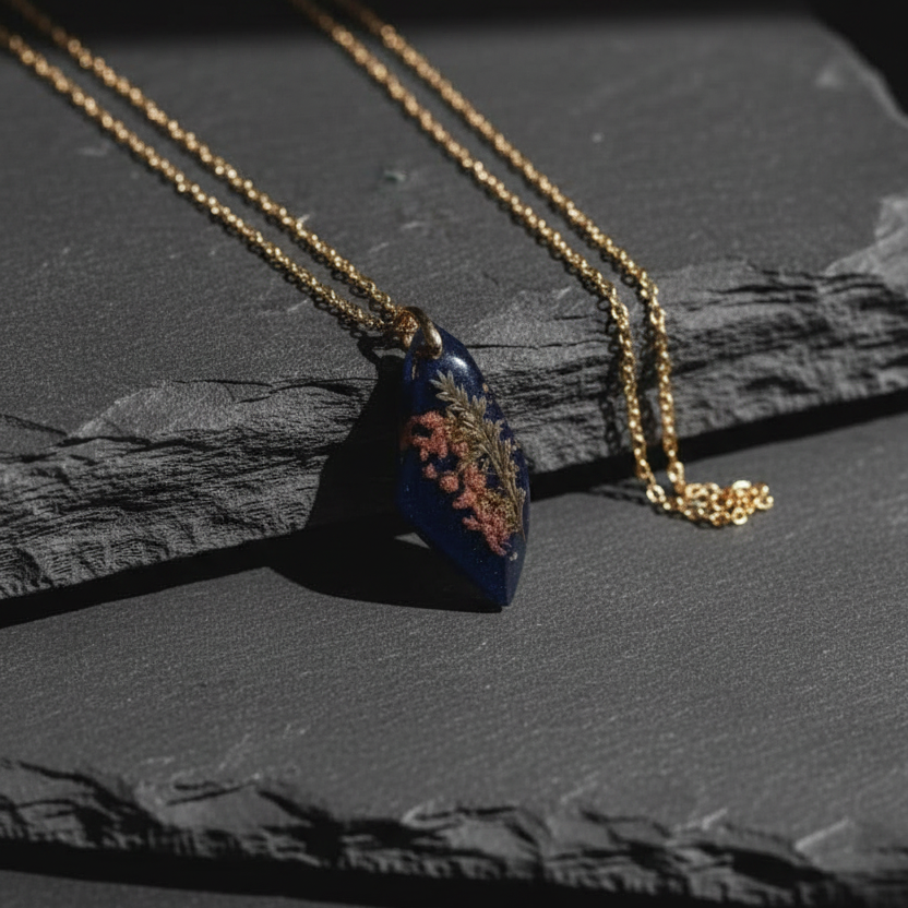 Teardrop navy pendant with botanicals