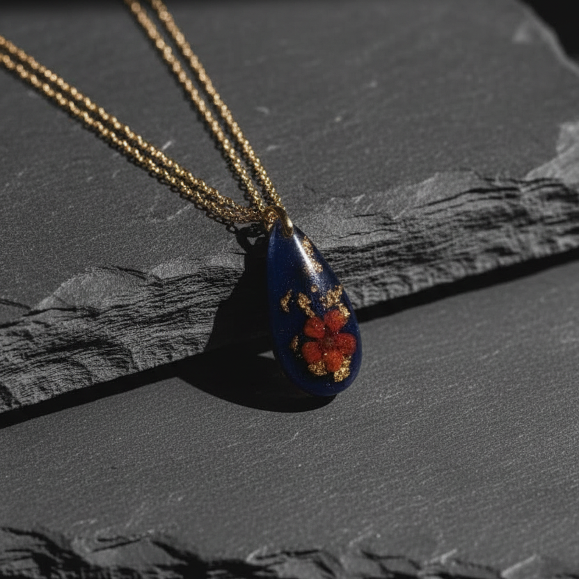 Teardrop navy pendant with red florals