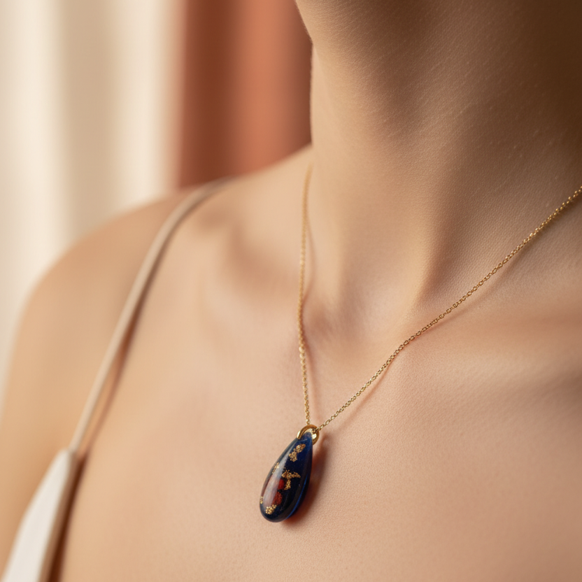 Teardrop navy red florals pendant on model